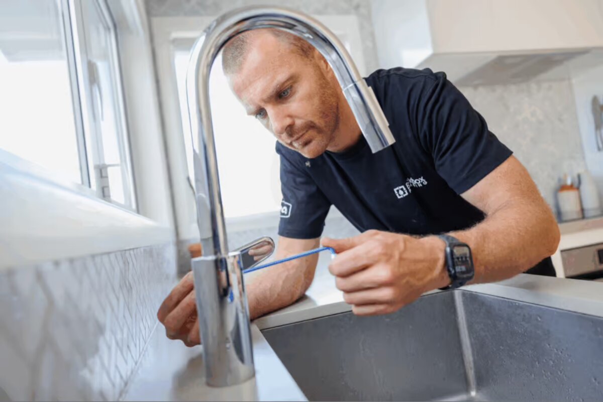 Blackbox Plumbing technician testing a finished tap installation